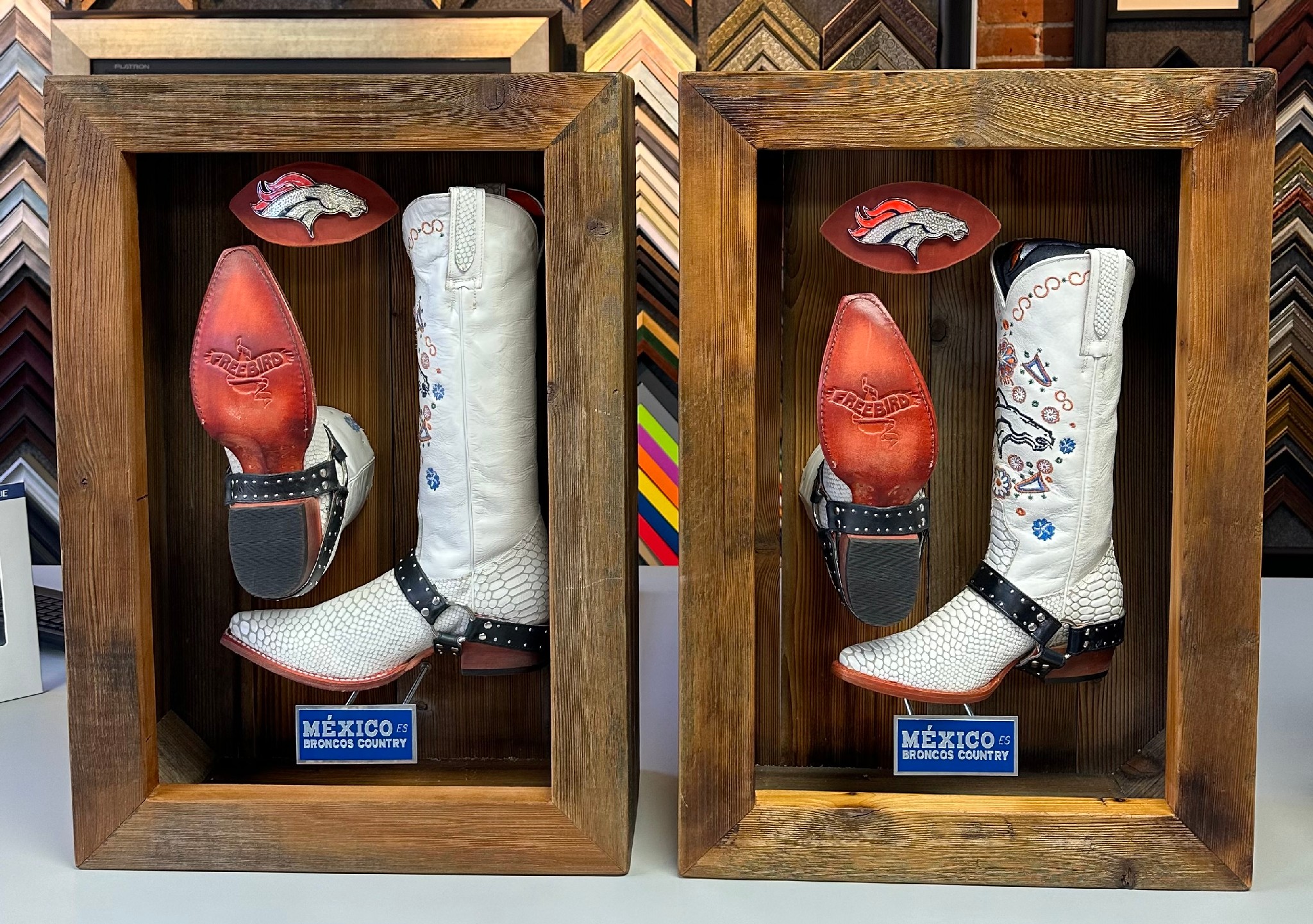 Custom shadow box display featuring handcrafted Denver Broncos cowboy boots created by 5280 Custom Framing