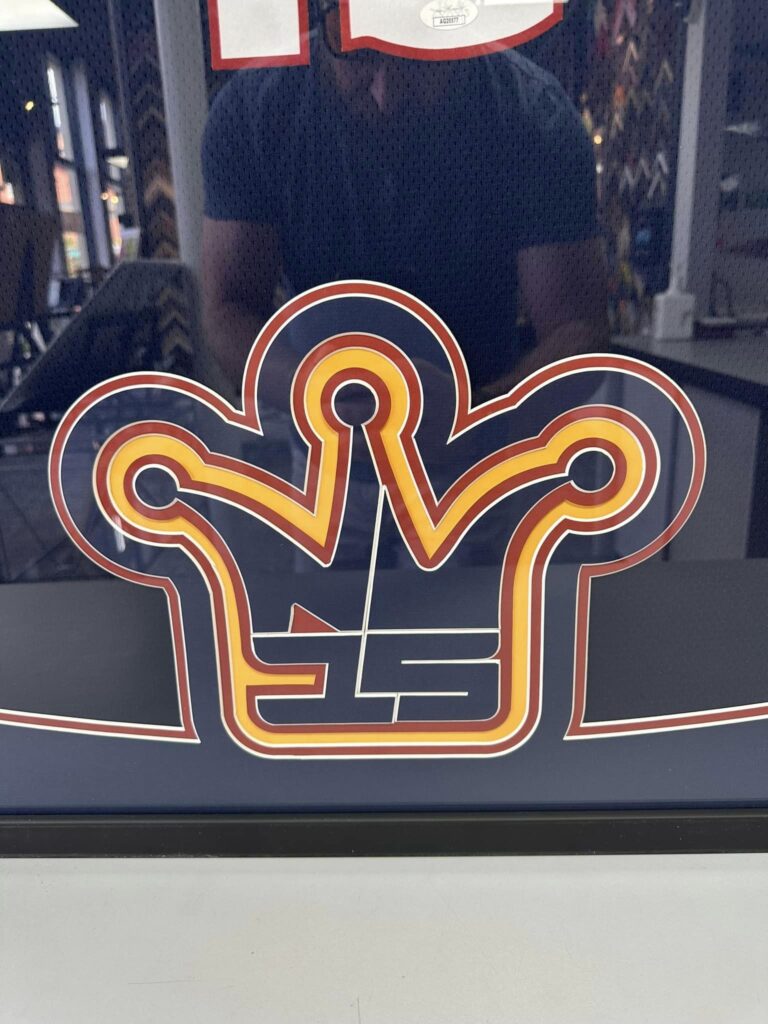 Custom crown logo mat design created with computerized mat cutting