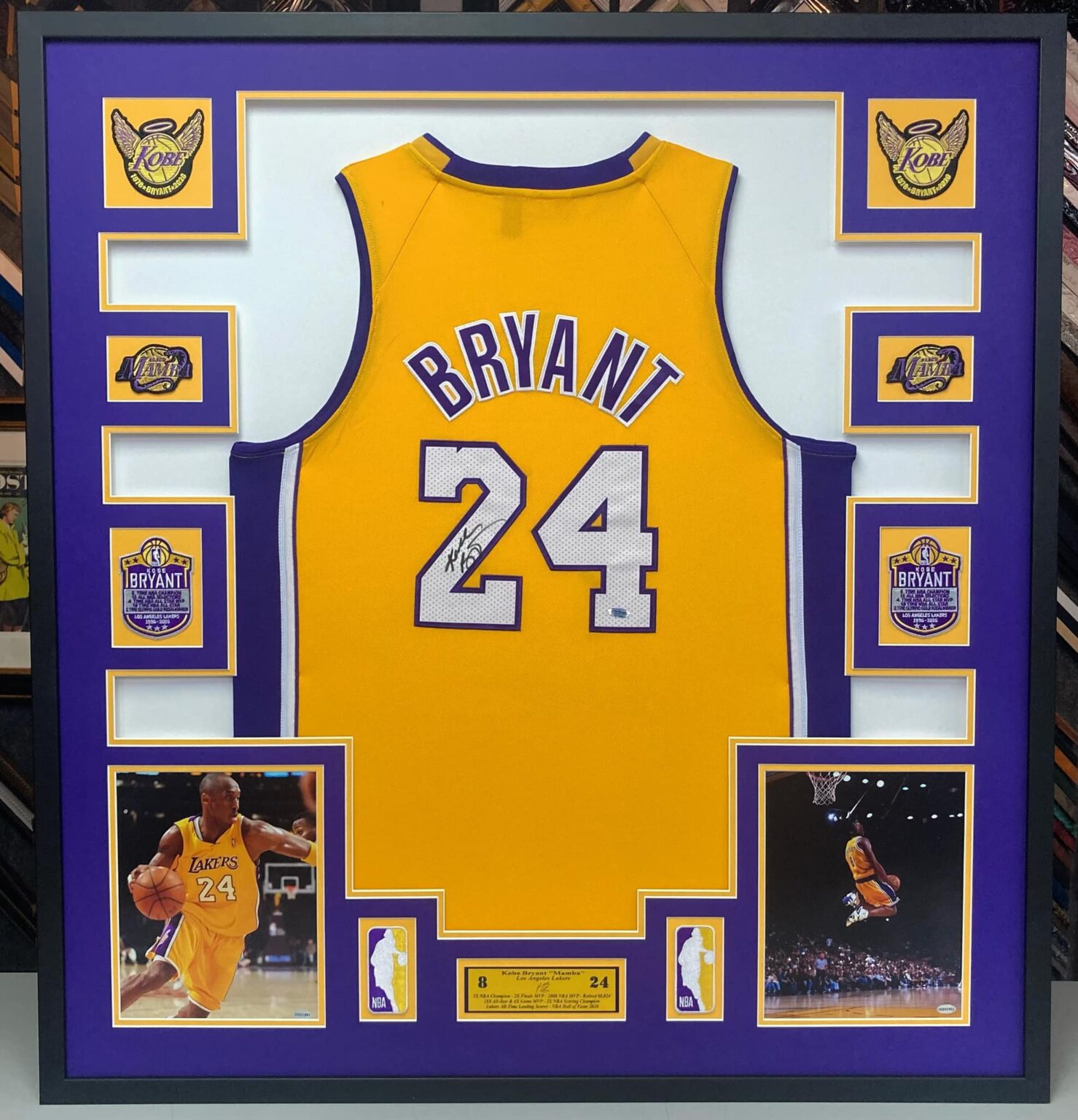 Custom framed autographed Kobe Bryant Los Angeles Lakers jersey with photographs and memorabilia